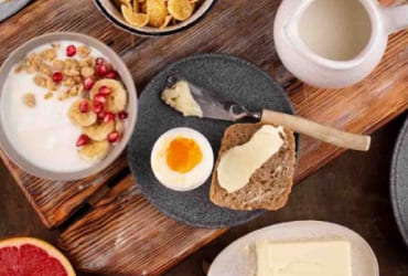 Rustic breakfast: soft-boiled egg, croissant, coffee