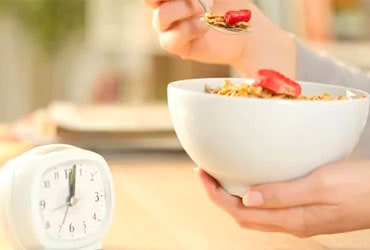 Fresh salad bowl with greens, tomatoes, cucumber