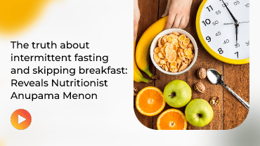 Hands chopping carrots & zucchini on cutting board